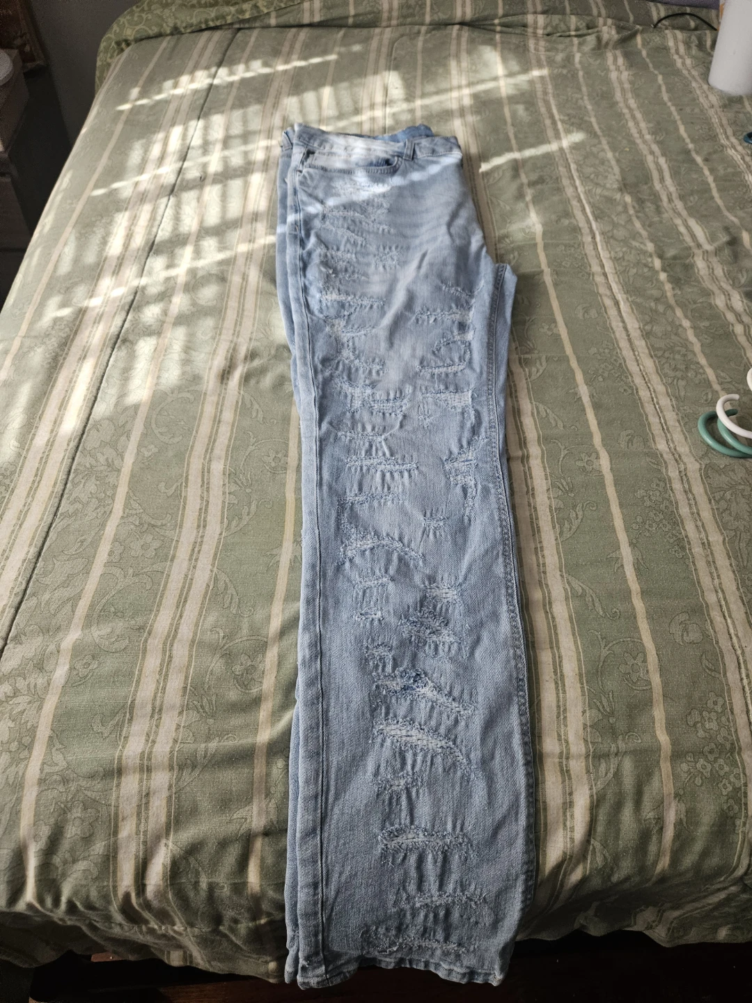 Distressed Light Wash Denim Jeans - photo 5