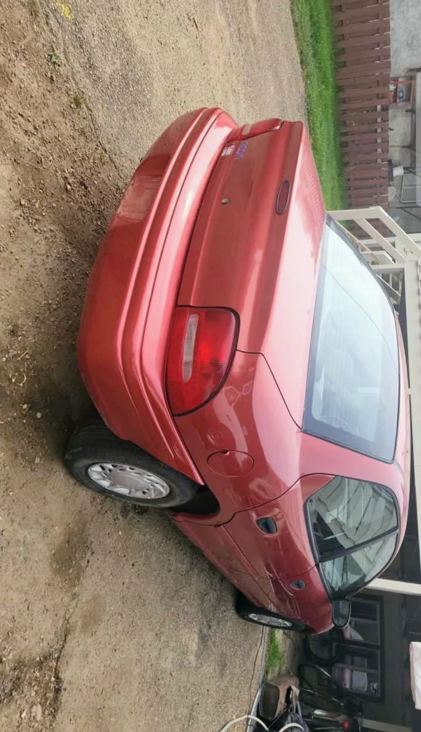 Red Dodge Neon Sedan - photo 2