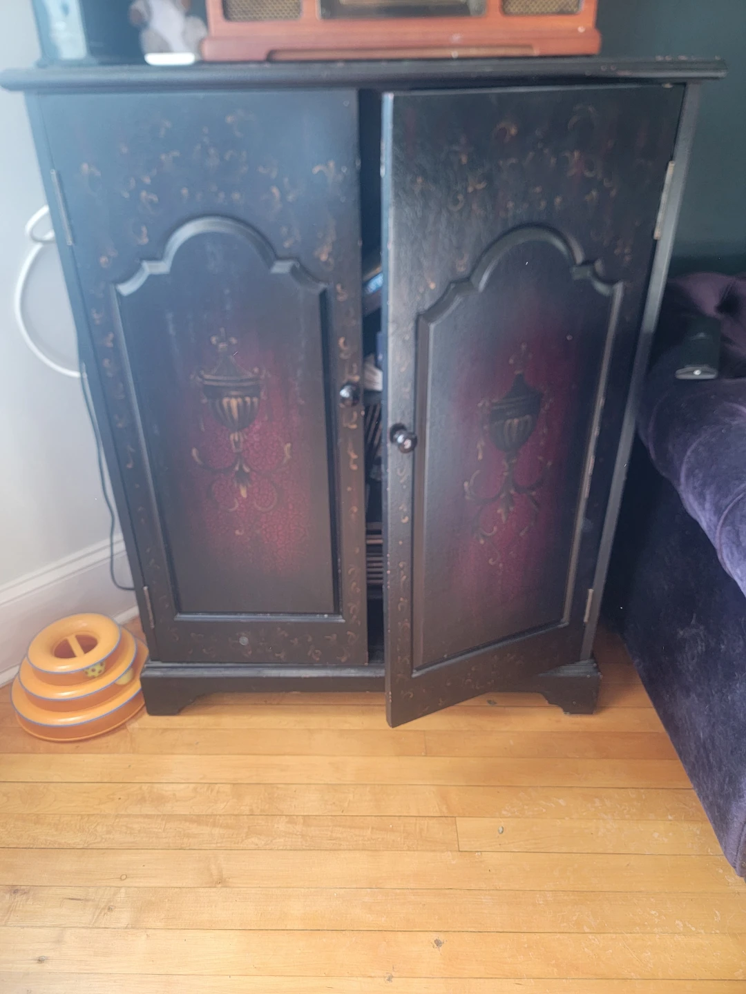 Black Cabinet with Decorative Accents