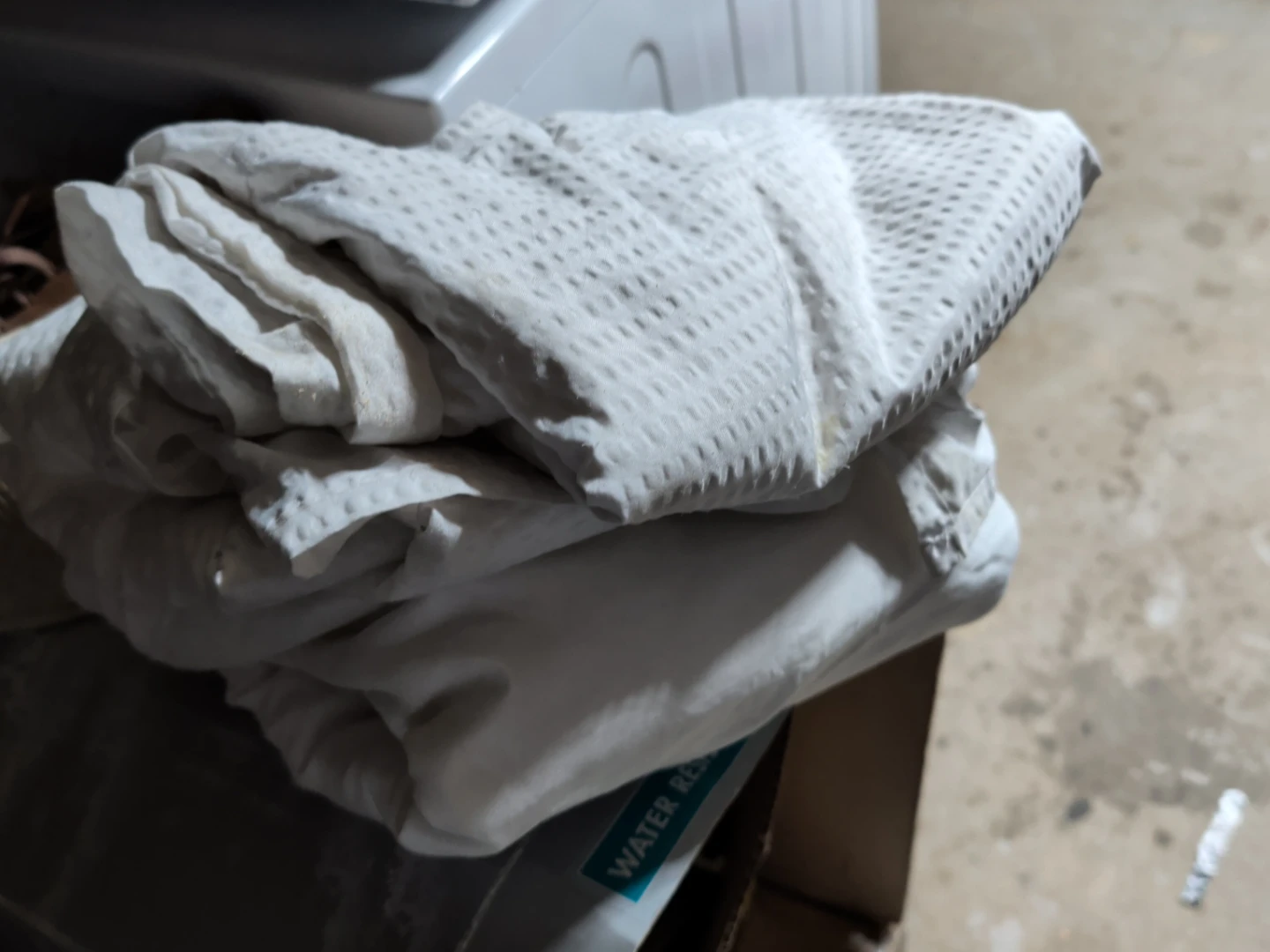 Assorted gray and white shower curtains