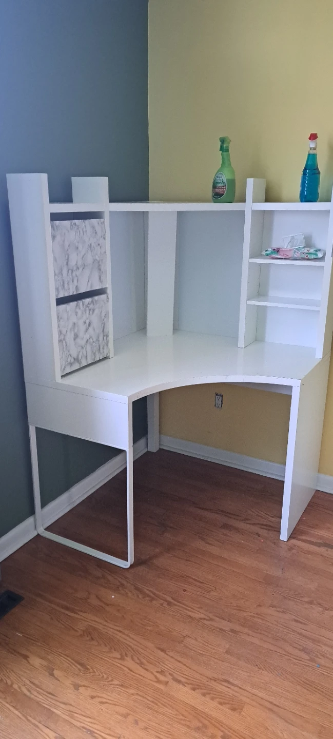 White corner desk with marble accent drawers