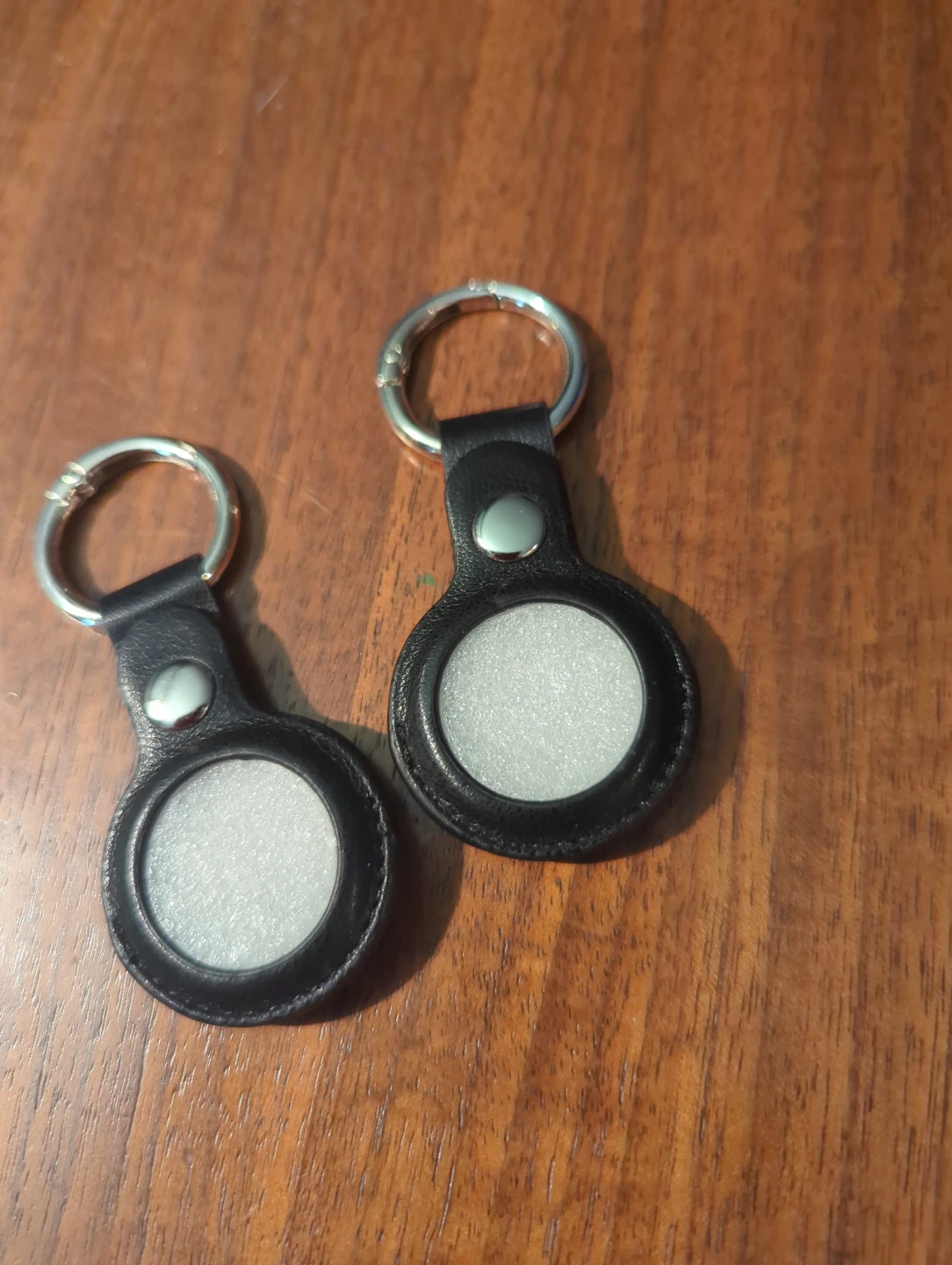 One Black Leather Airtag Keychains with Silver Rings
