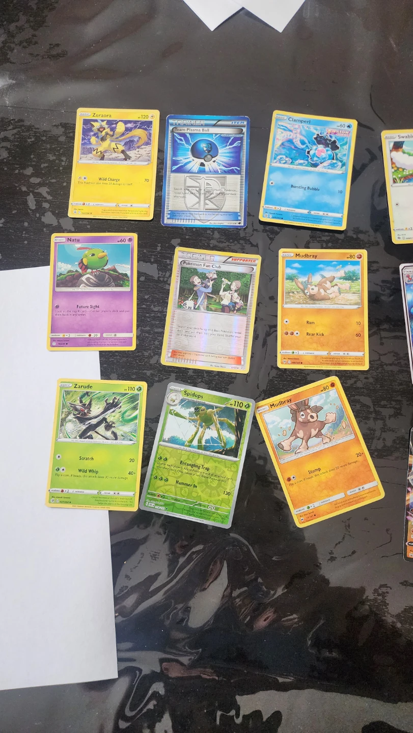 Assorted Pokémon Trading Cards, an mix of card