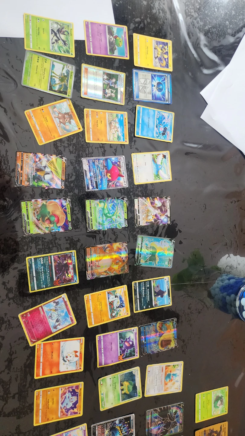 Assorted Pokémon Trading Cards, an mix of card - photo 3