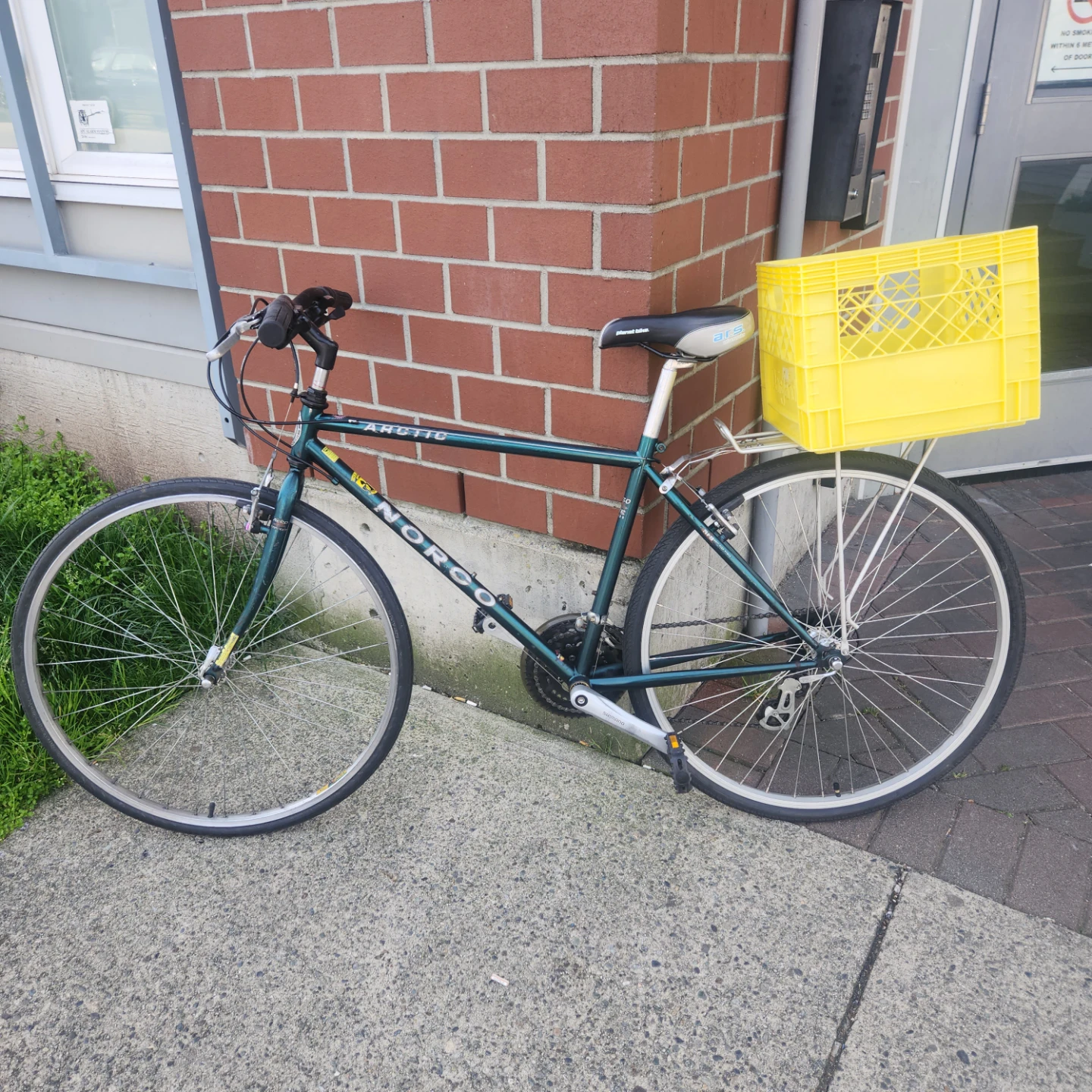 Norco Arctic Bicycle with Yellow Crate
