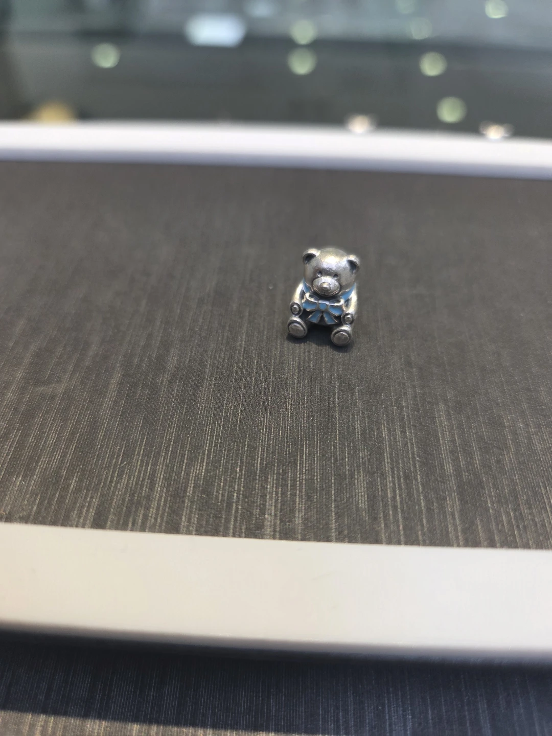 Silver Teddy Bear Charm with Blue Bow