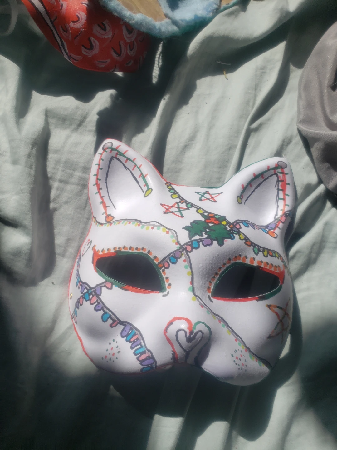 Hand-Painted Cat Mask with Festive Design