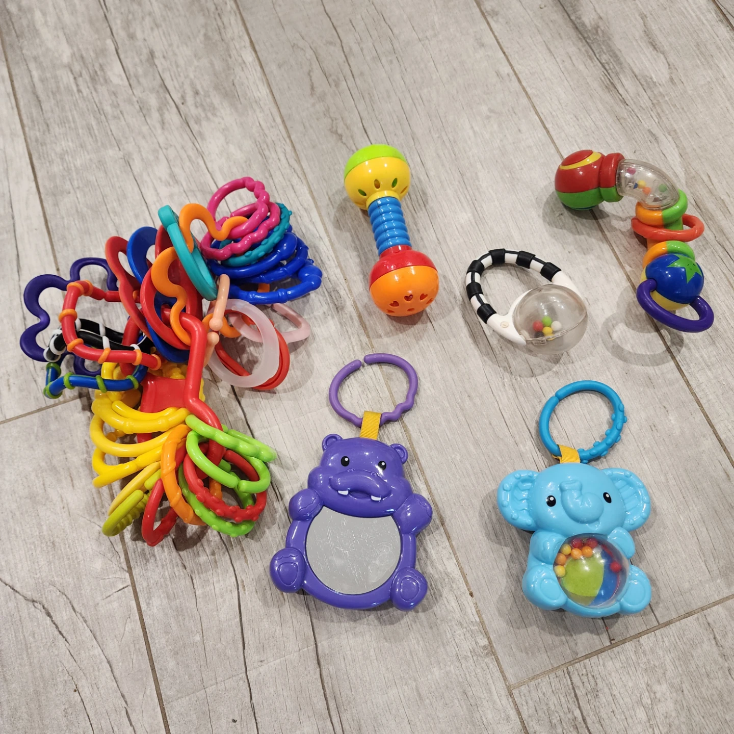 Baby Toy Lot - Rattles and bundle of C hooks