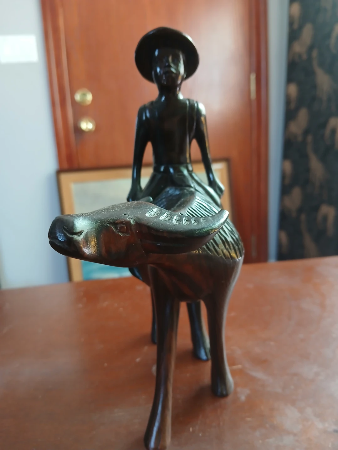 Carved Wooden Figurine of Man Riding Water Buffalo - photo 3