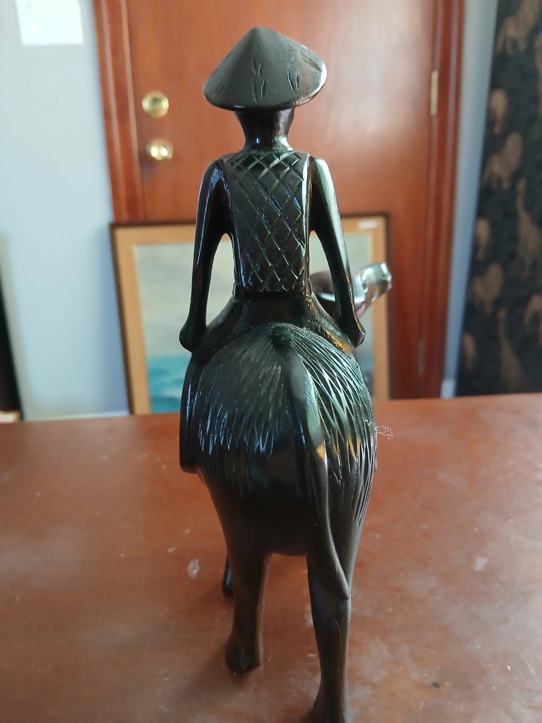 Carved Wooden Figurine of Man Riding Water Buffalo - photo 4