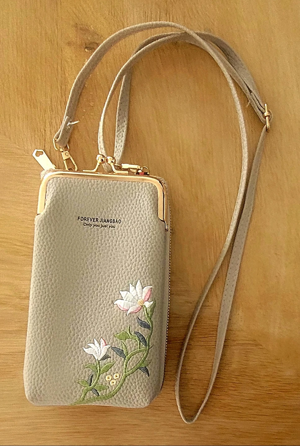 Grey Embroidered purse with Strap.