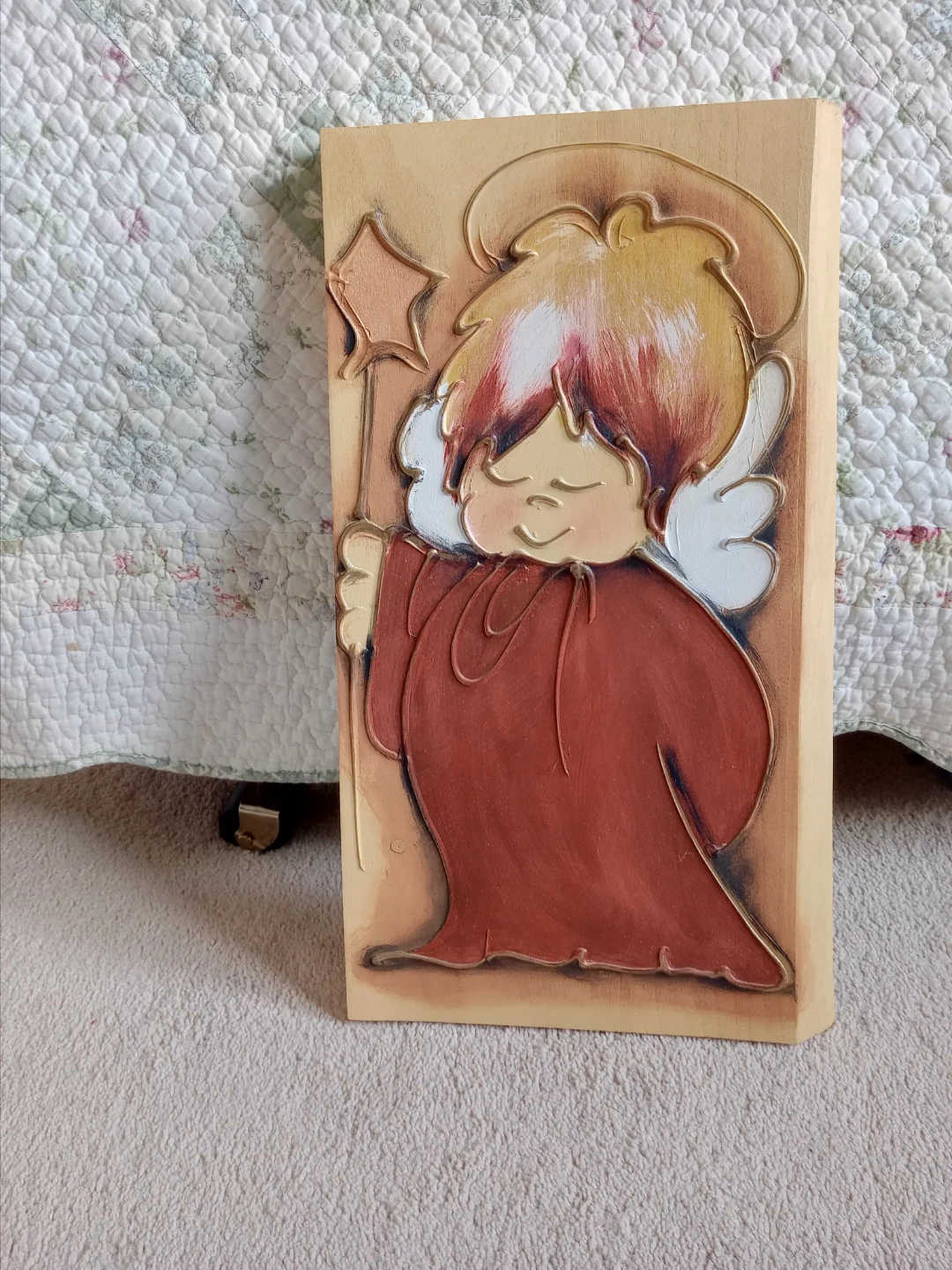 Angel painting on piece of wood
