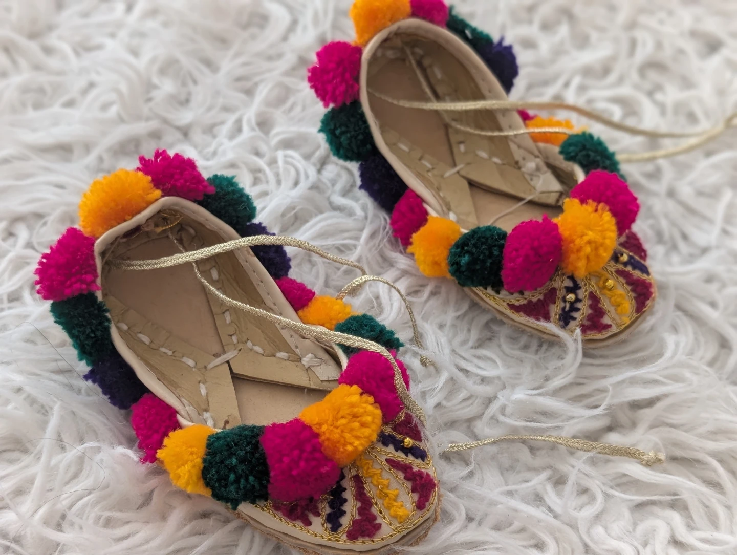 Embellished baby khussa with Pom-Poms