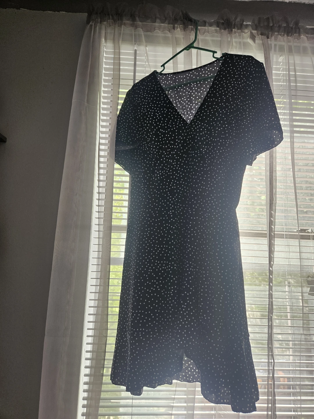 Black polka dot wrap dress