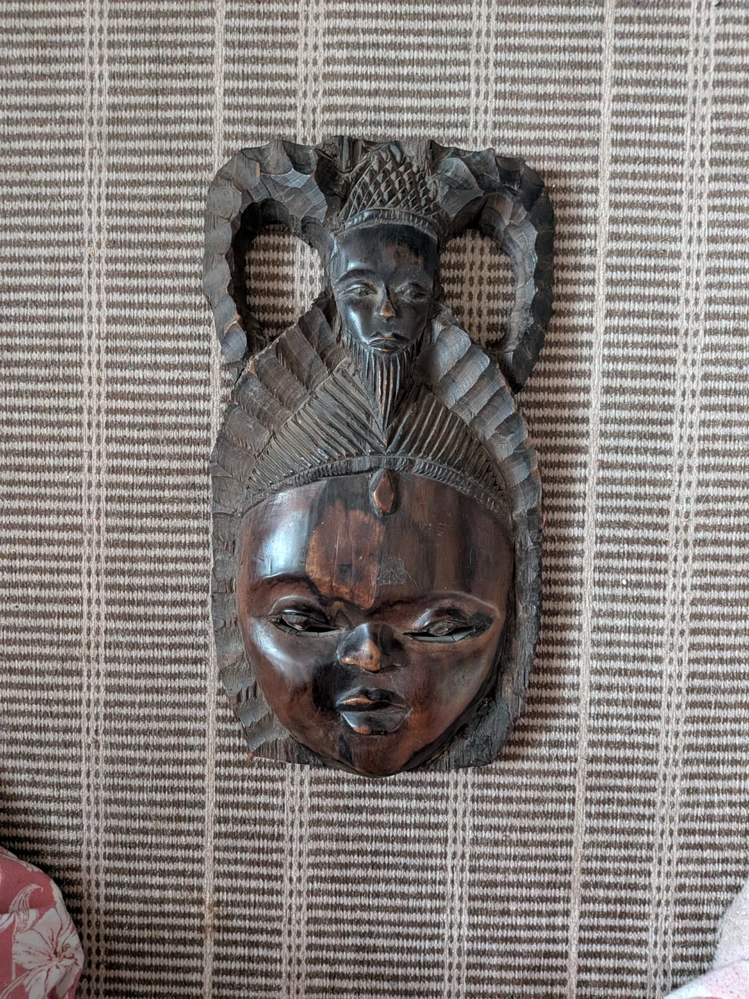 Hand Carved Wooden Tribal Mask Wall Hanging. The wood is ebony