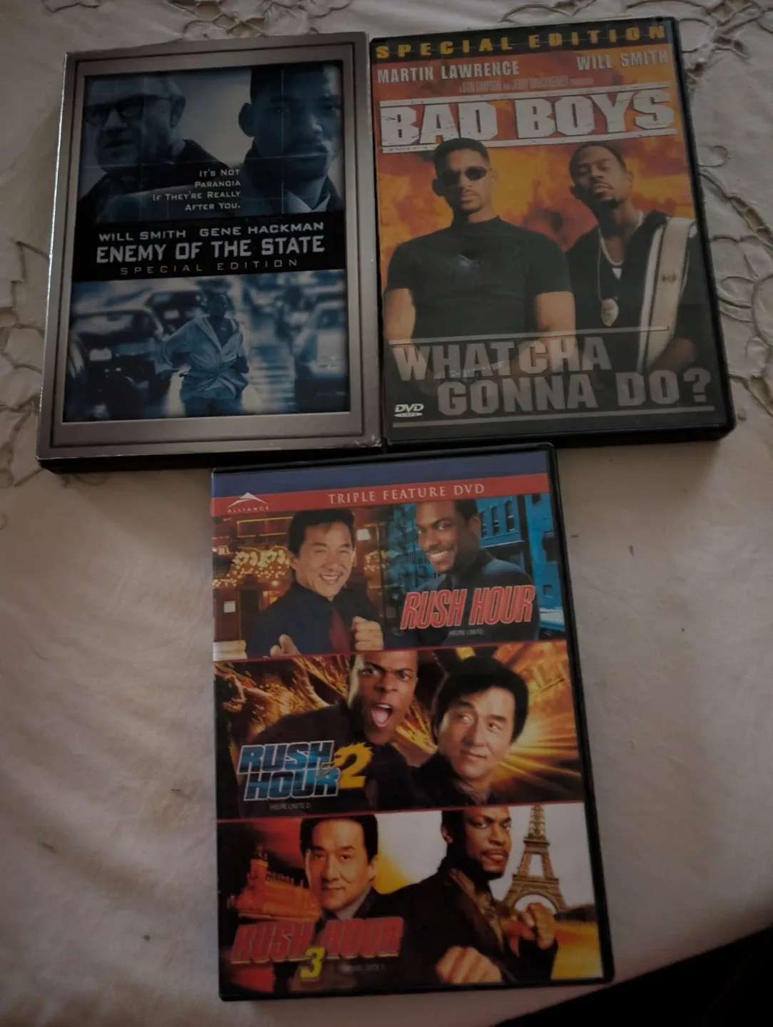 DVDs: Enemy of the State, Bad Boys, Rush Hour Triple Feature
