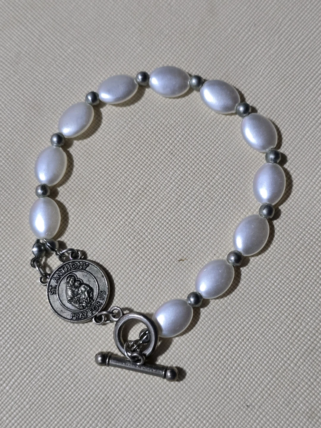 Pearlized Bead Bracelet with St. Anthony Charm