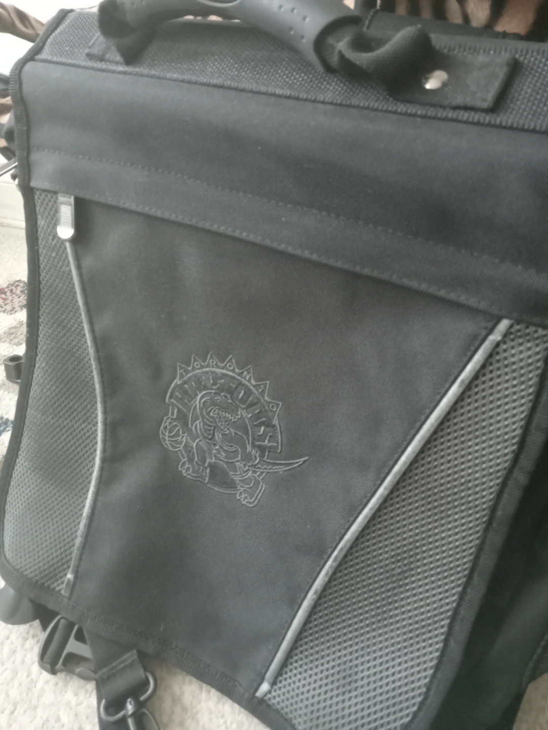 Black Messenger Bag with Dinosaur Logo