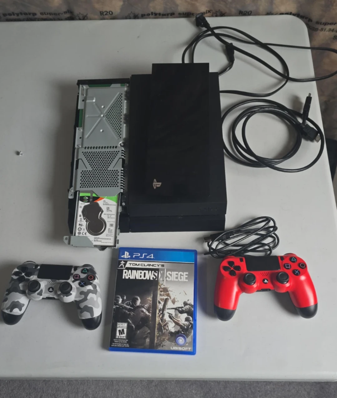 Sony PlayStation 4 2TB Console with 2 Controllers and Game