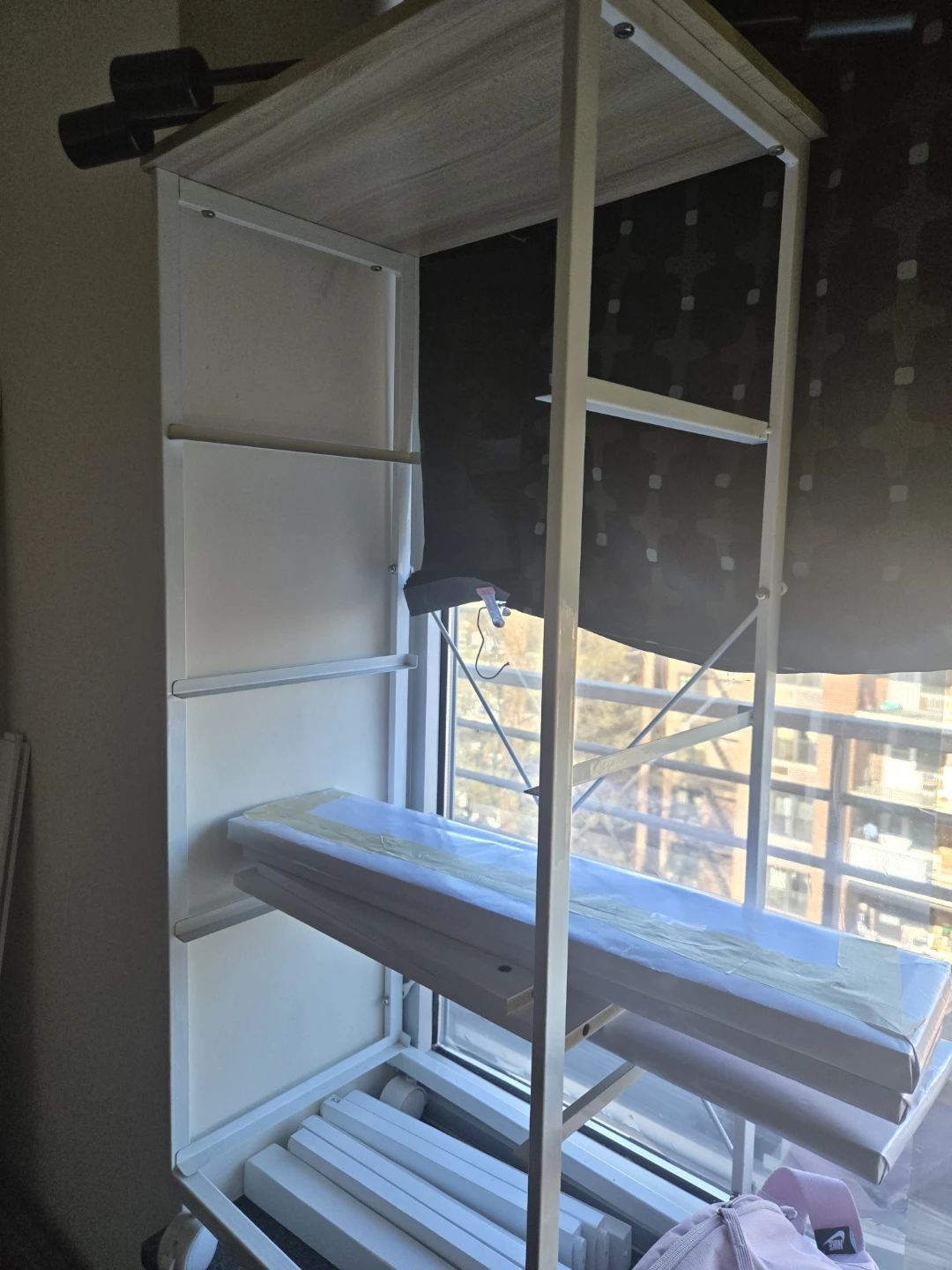 White Metal Clothes Rack with Wheels
