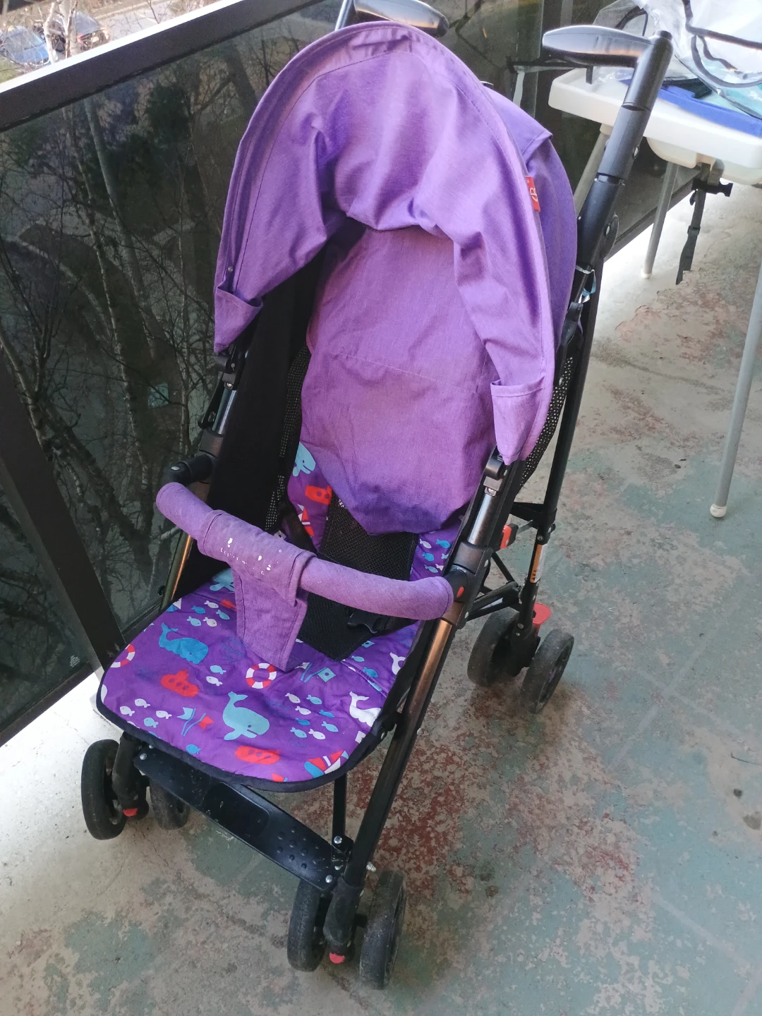 Purple Stroller with Fish Pattern