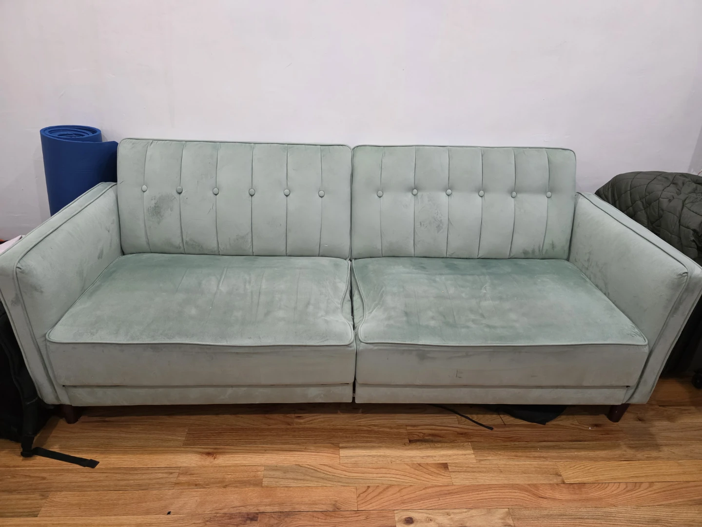 Light green tufted sleeper sofa
