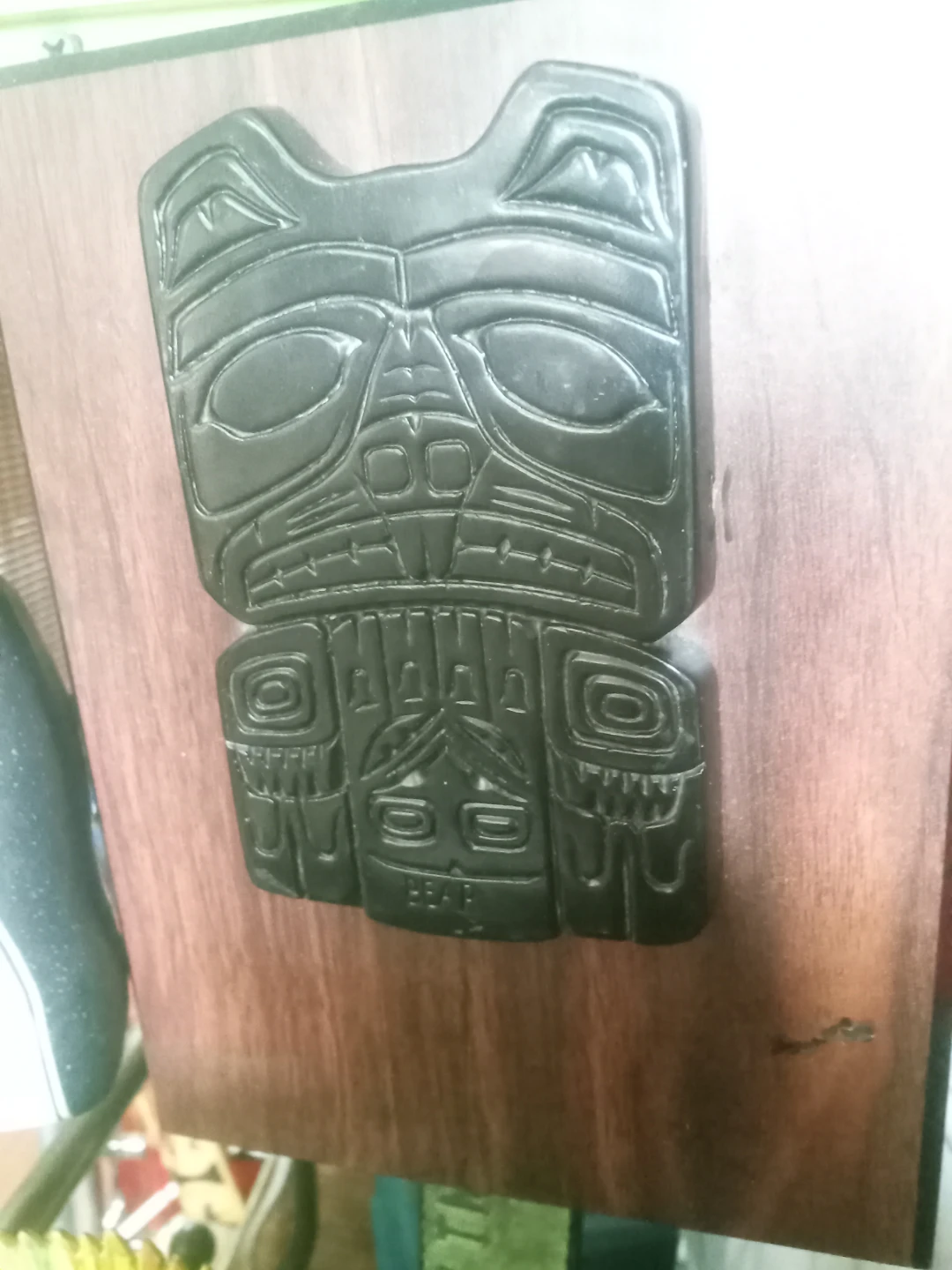 Carved Bear Figurine on Wooden Plaque