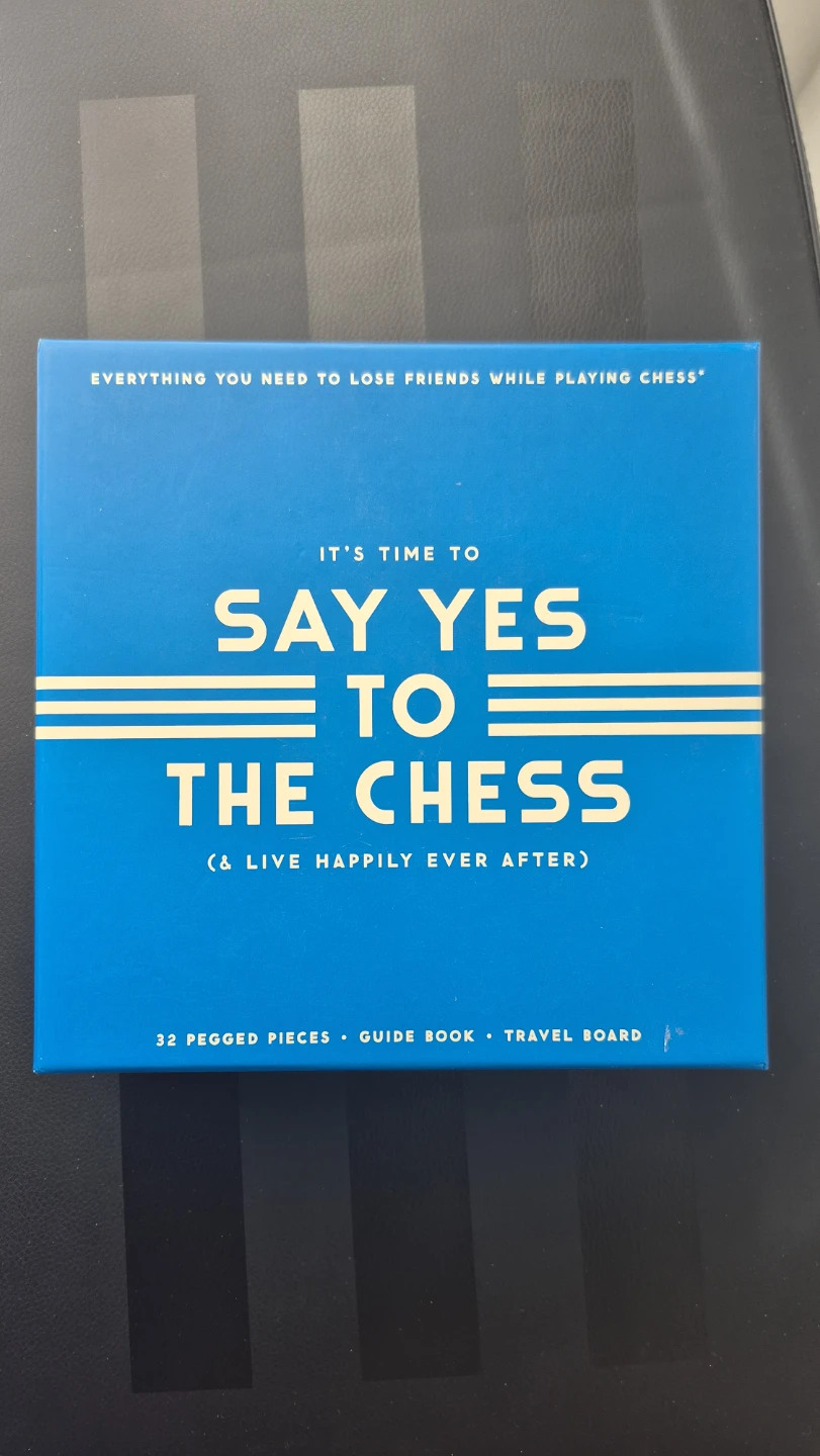 Chess set with book & pegged pieces