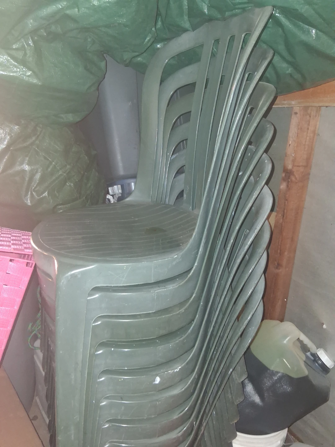 Stack of 10 Green Plastic Chairs
