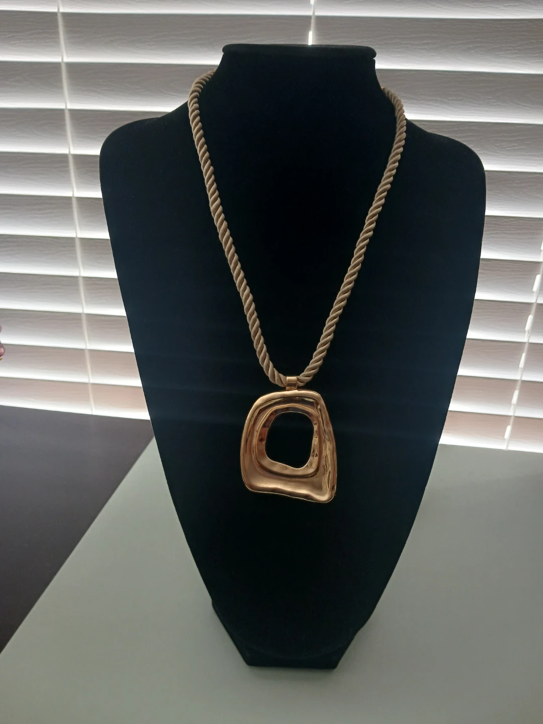 Gold Tone Rope Chain Necklace with Abstract Pendant