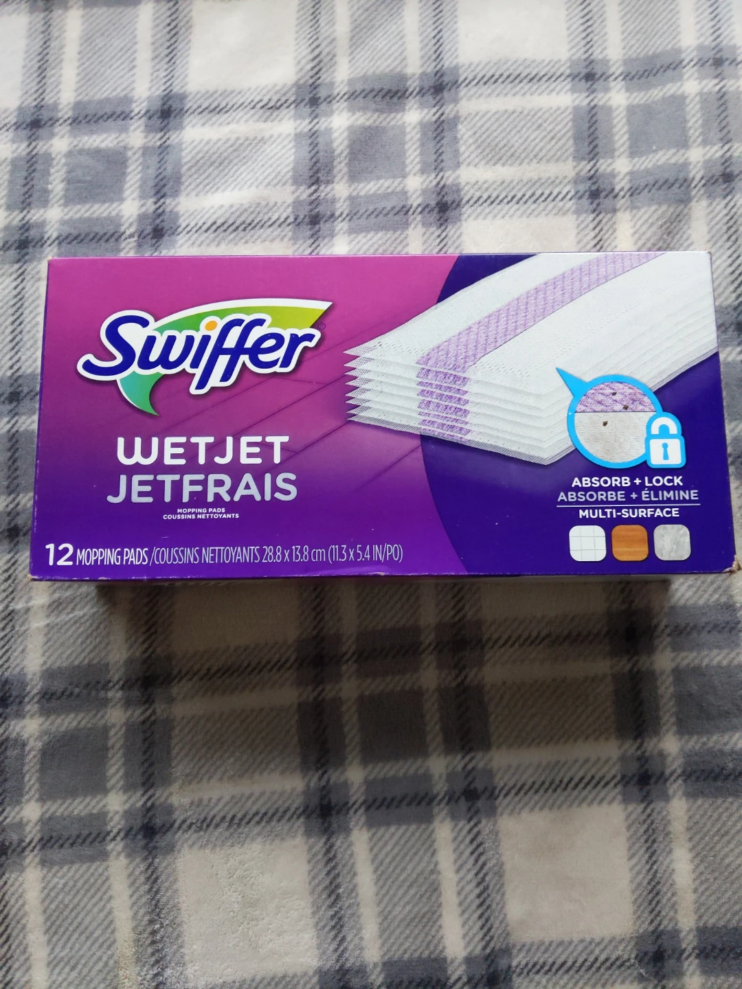 New but opened. Swiffer WetJet Refill Mopping Pads - 12 Pack