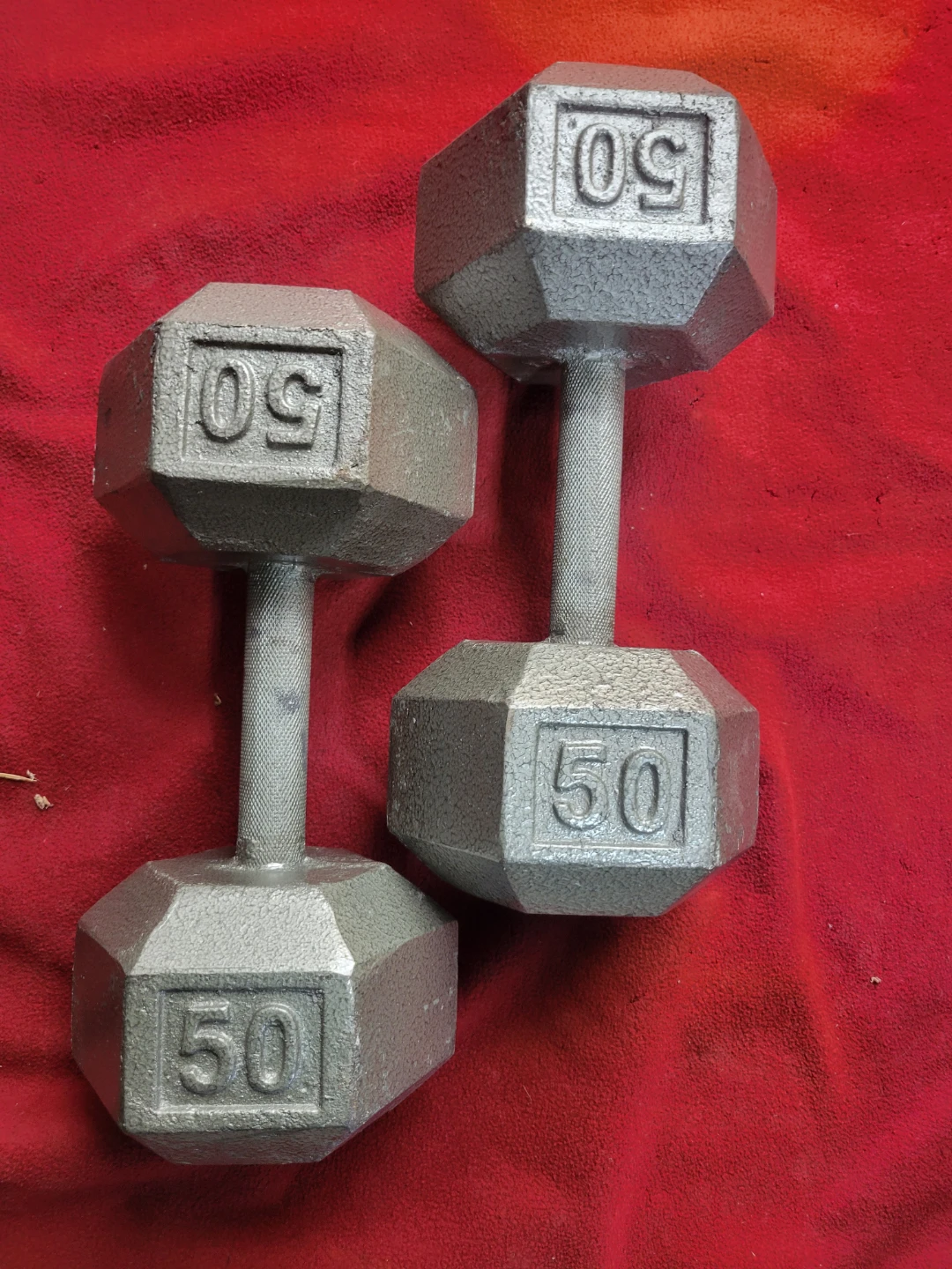 SET OF 50LB.  HEXHEAD DUMBBELLS TOTAL 100LBs