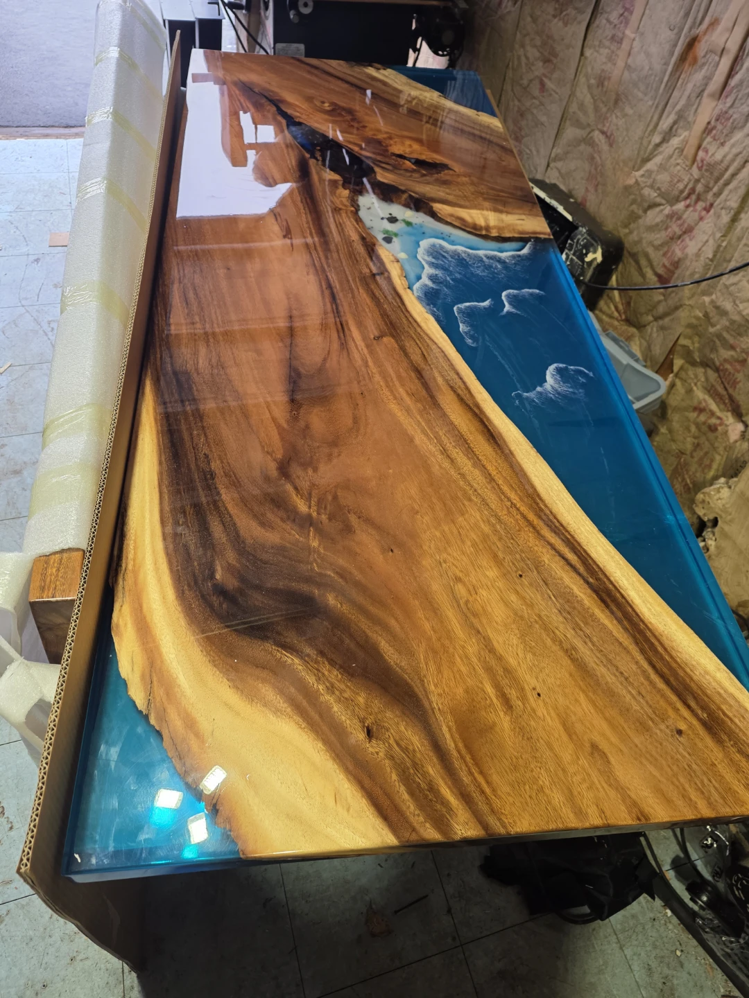 River Table with Live Edge Wood and Ocean Epoxy