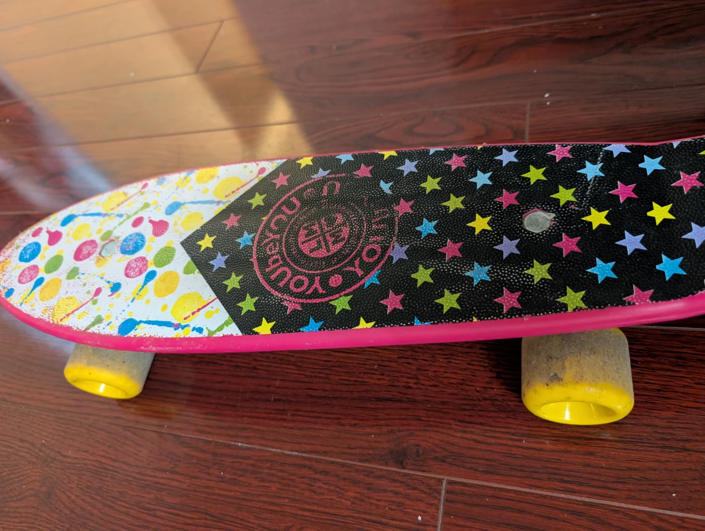 Pink Penny Board Style Skateboard with Star Design