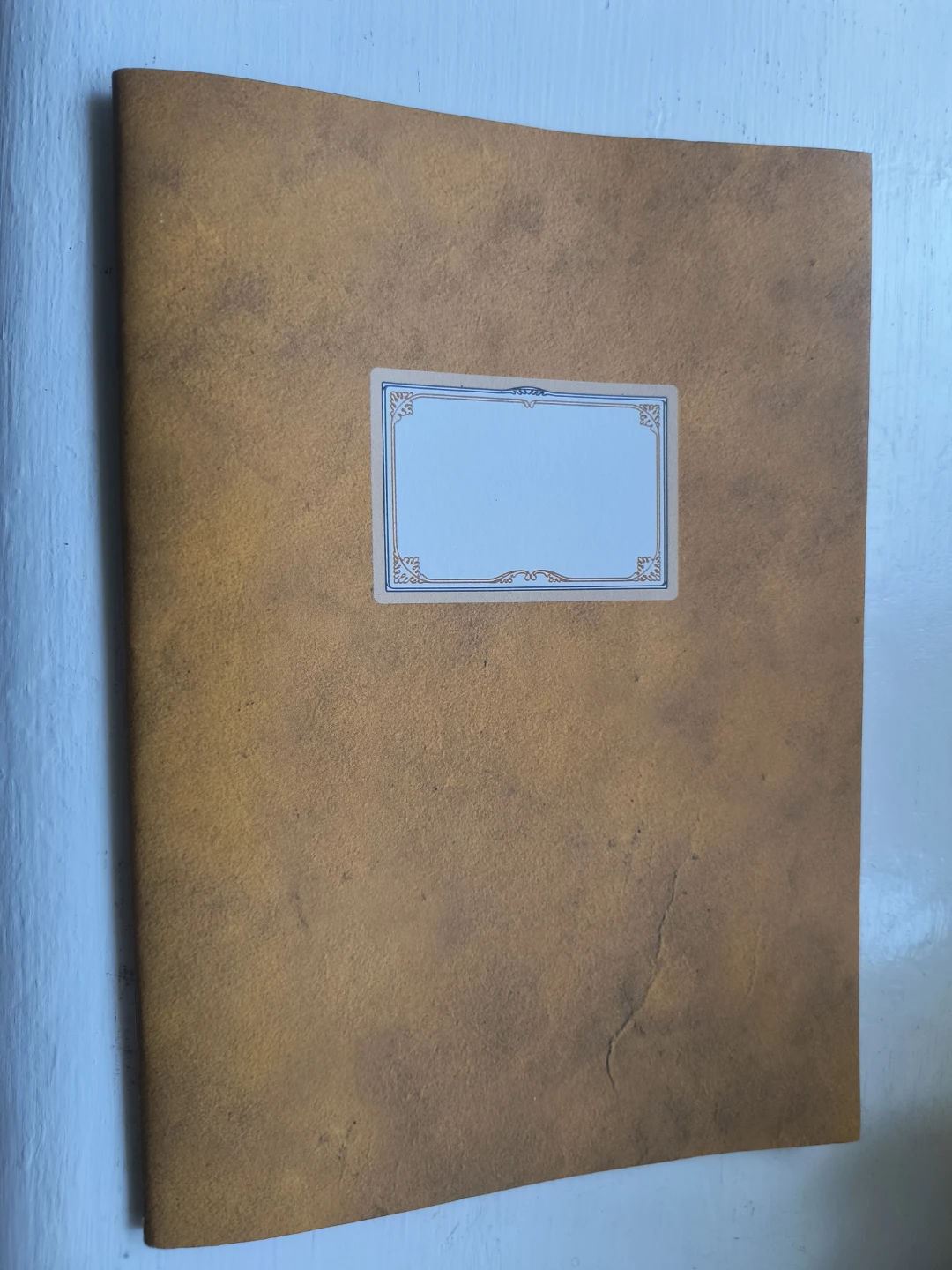 Brown Notebook with Blank Label