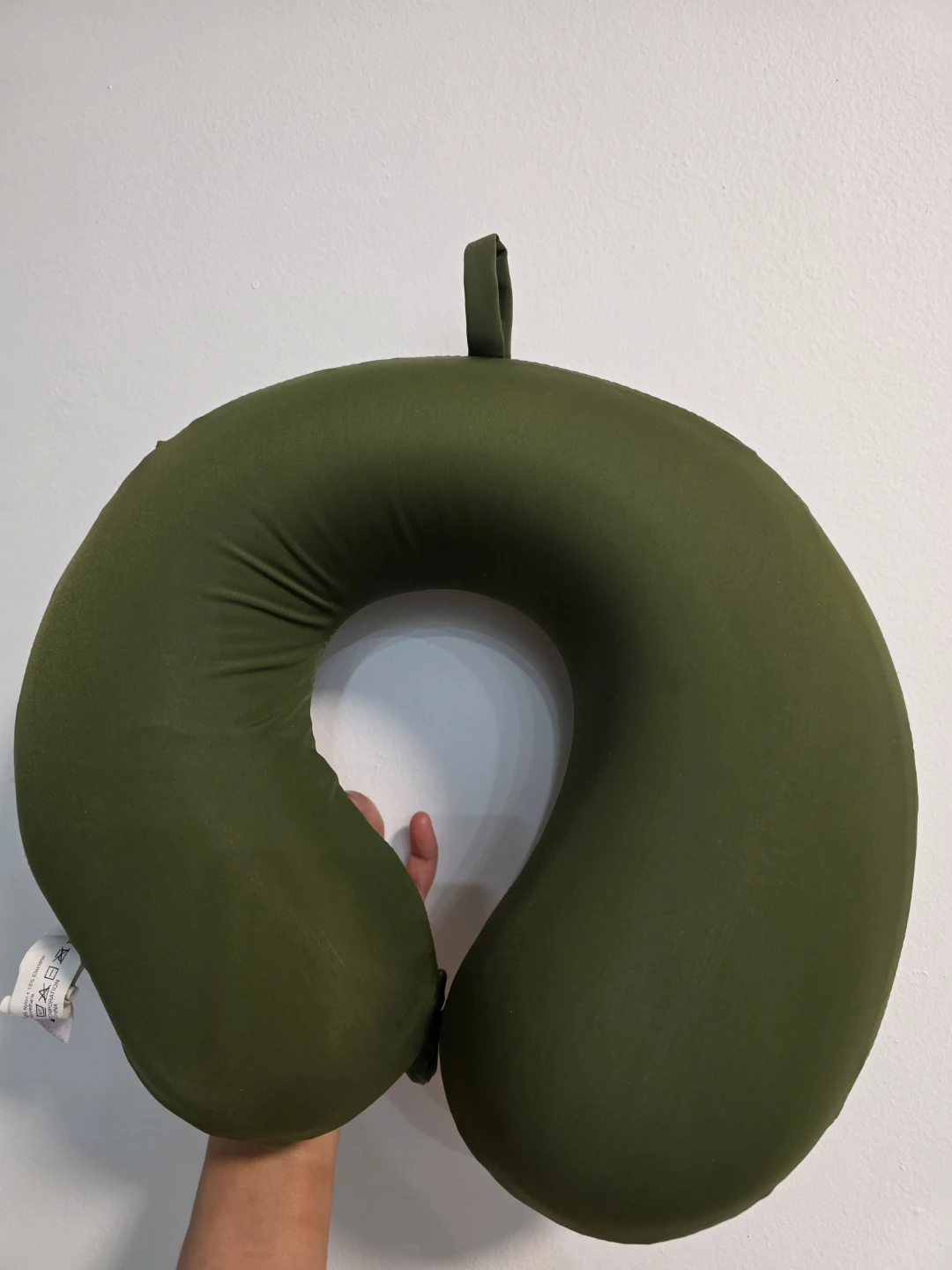 Miniso neck pillow - dark (olive?) green