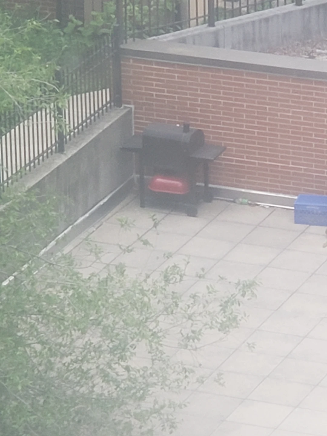 Black Smoker BBQ Grill and Red Grill