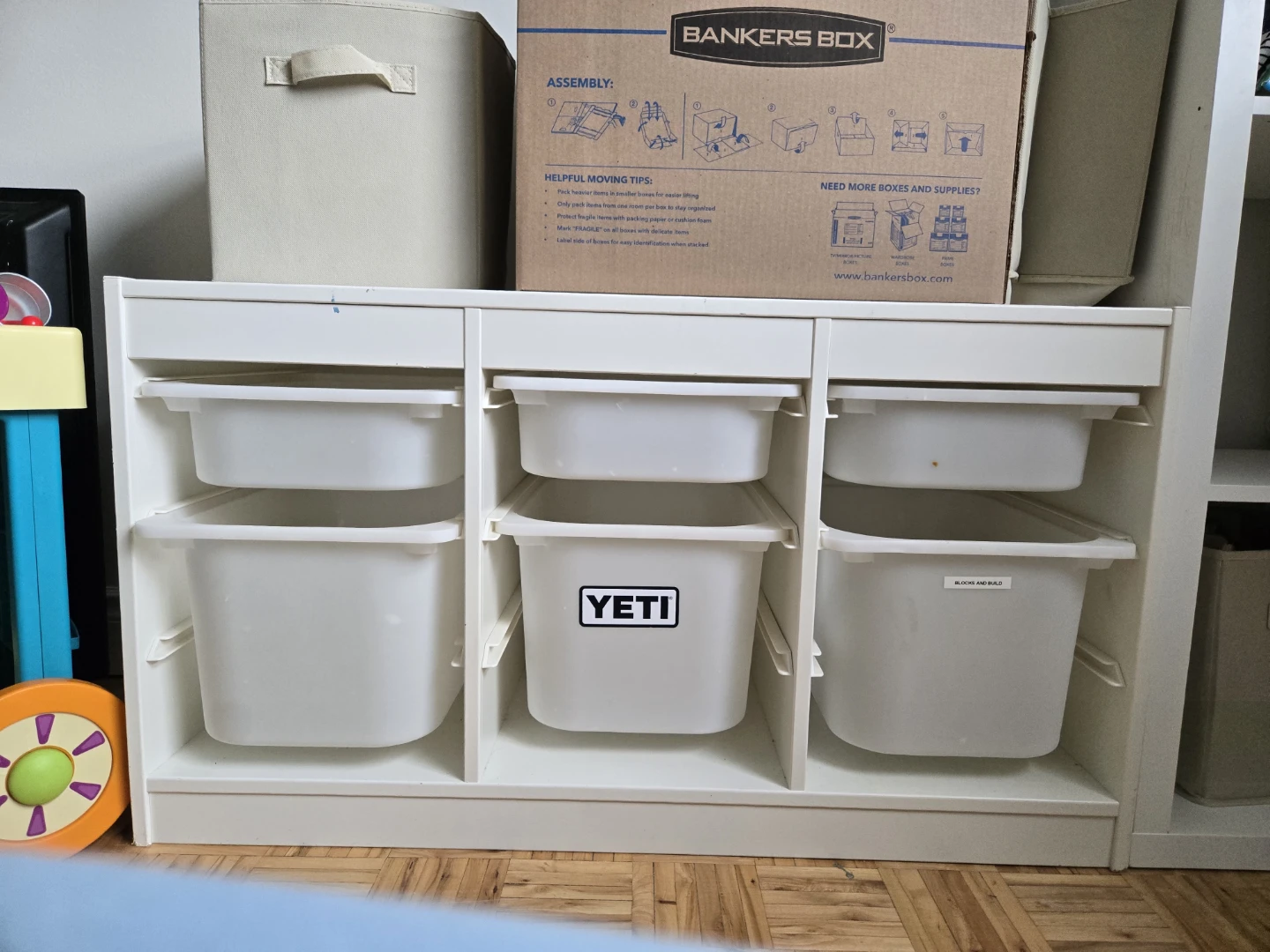 White Storage Unit with 6 Plastic Bins
