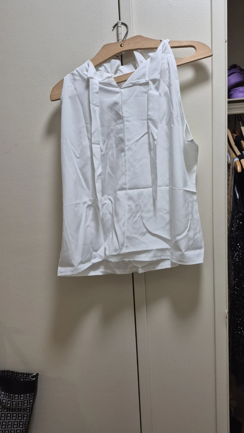 White sleeveless blouse