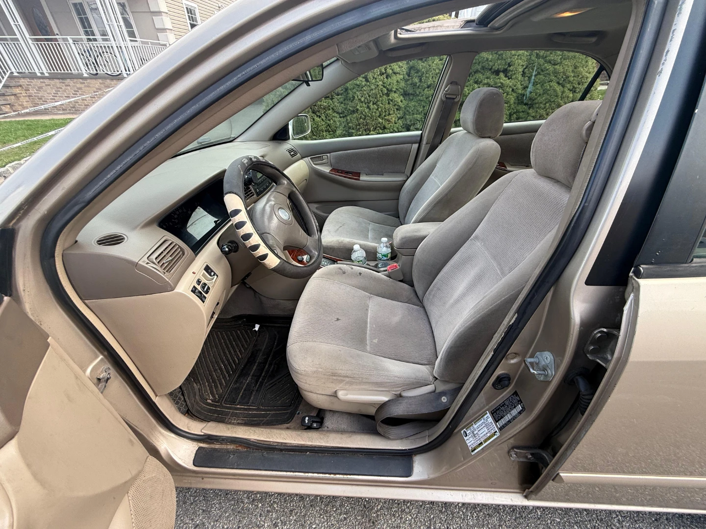 Gold Toyota Corolla Sedan