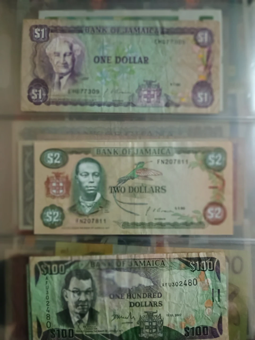 Bank of Jamaica Bills - $1, $2, and $100 - photo 2