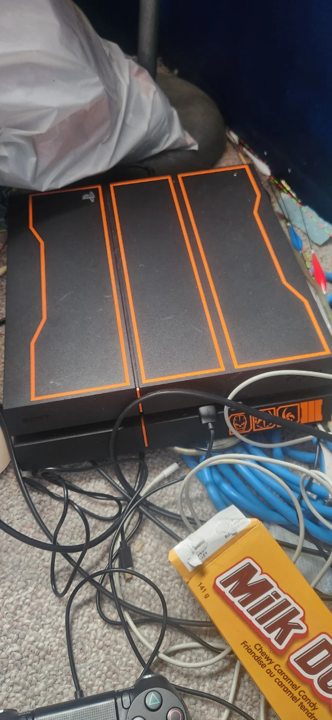 PlayStation 4 Console with Games and Controller