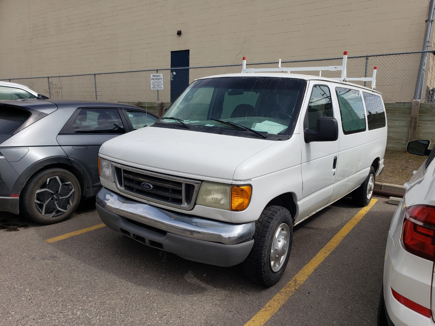 White Ford E-Series Van with Ladder Rack - photo 2