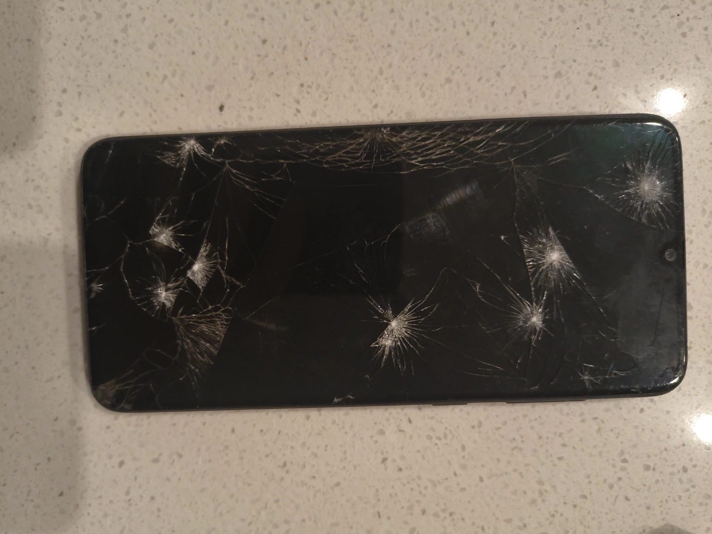 Black Smartphone - Cracked Screen