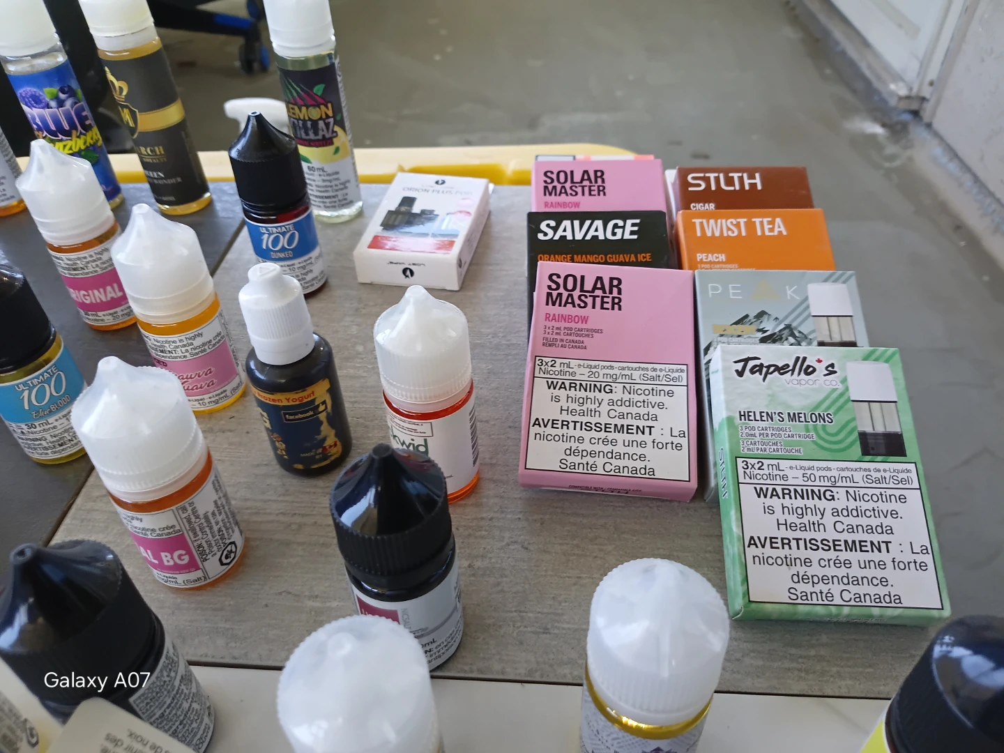Assorted Vape Juice Bottles and Pods - photo 3