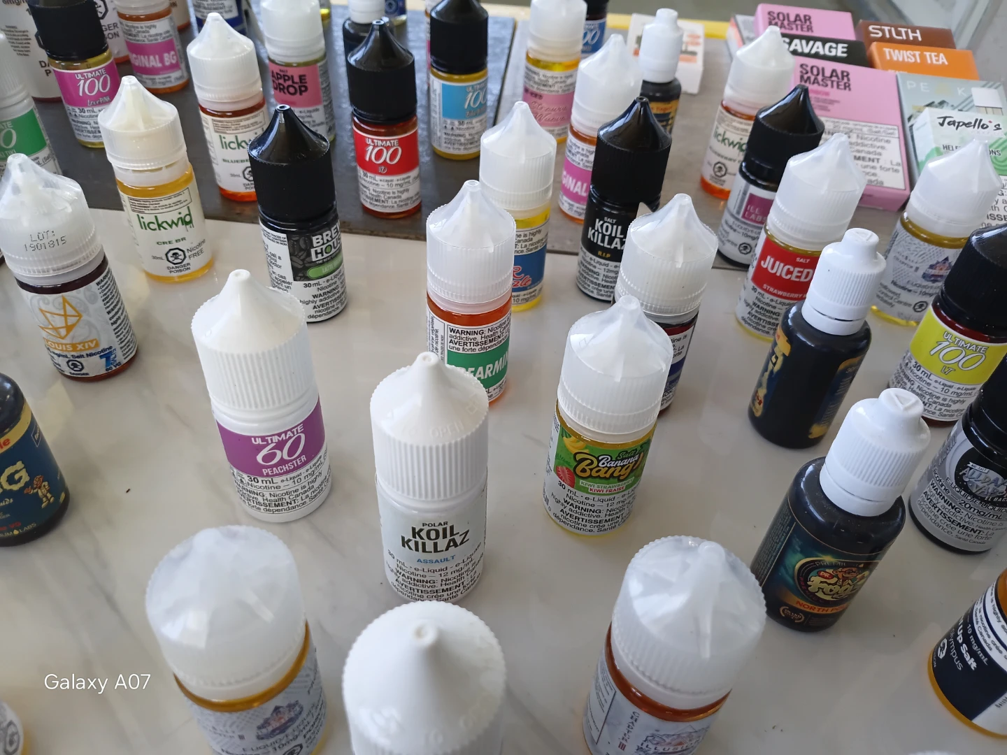 Assorted Vape Juice Bottles and Pods - photo 4