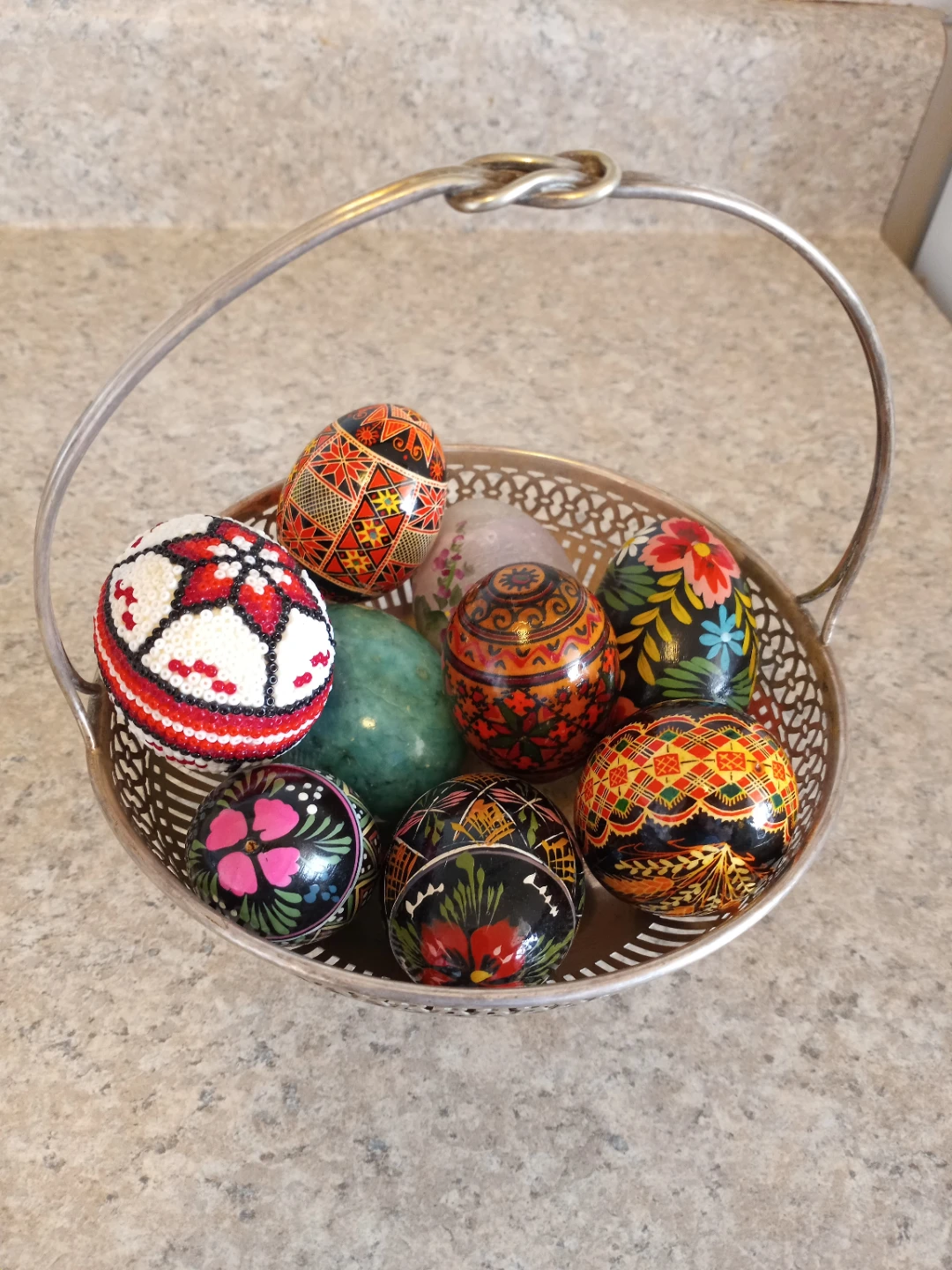 Assorted Decorative Easter Eggs and Silver Basket