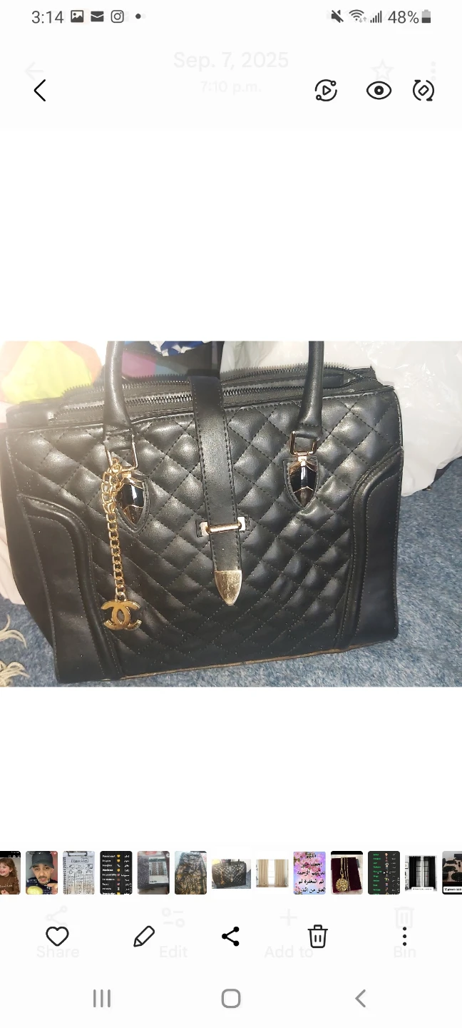 Black Quilted Handbag with Gold Accents