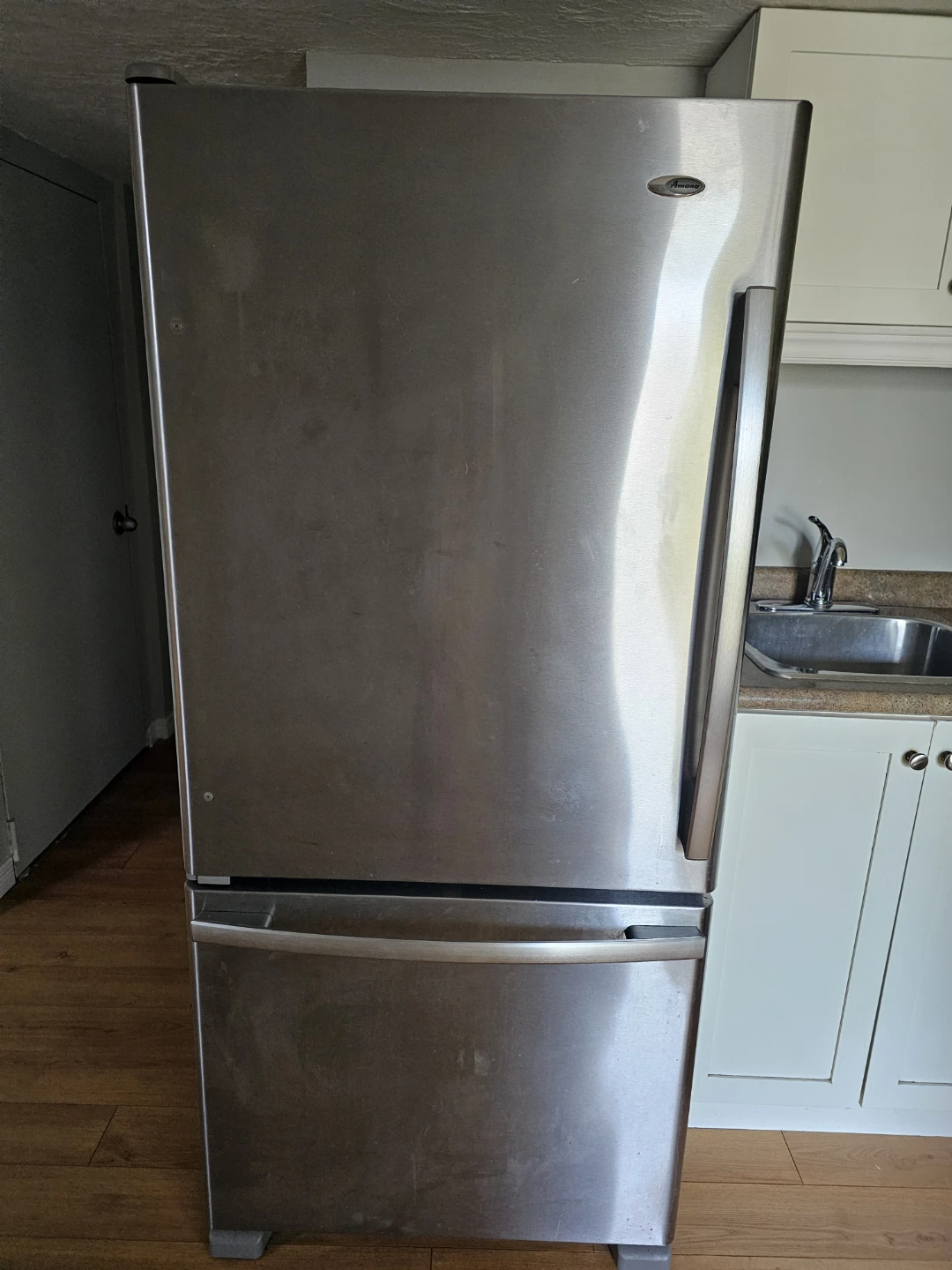 Brand new Amana stainless steel fridge