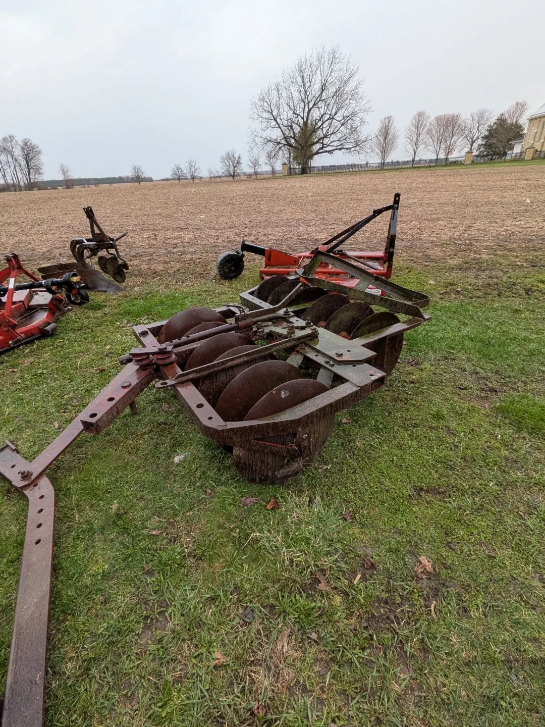 Red Rotary Tiller and Disc Harrow